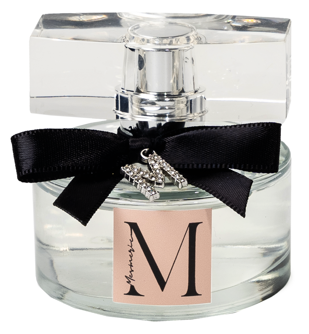 A bottle of M like Mesmeric parfume.