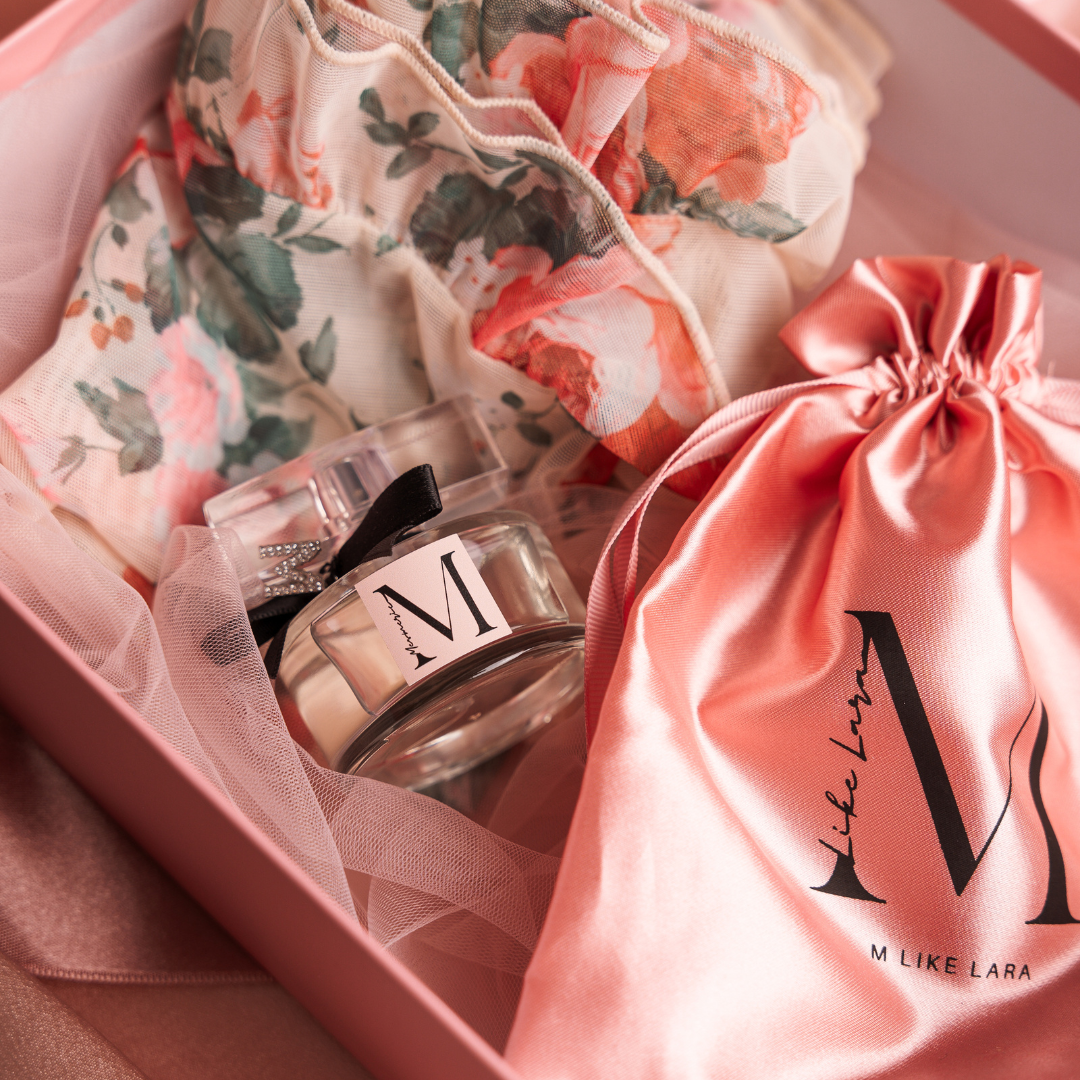 Parfum bottle and silk satin bag and satin nightwear